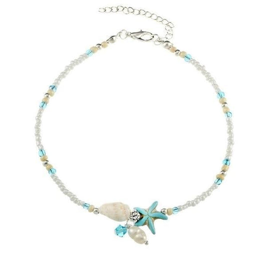 Arete de tobillo con estrella y concha con piedras naturales