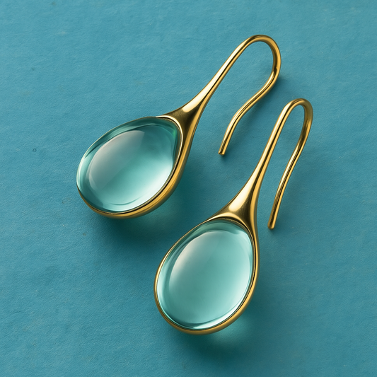 Pendientes de gota de cristal en oro y plata