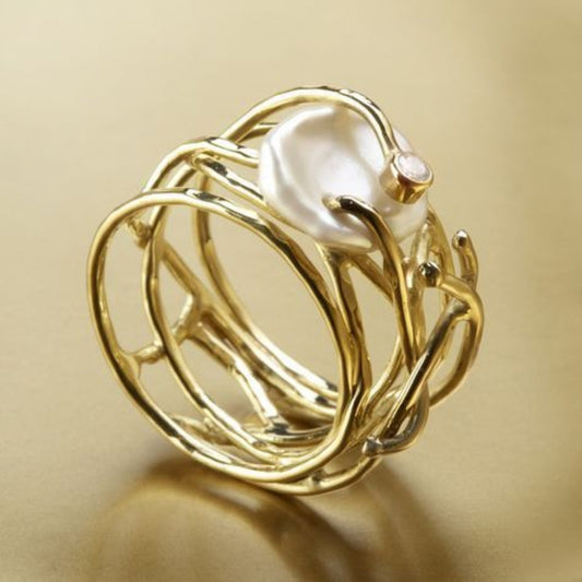 Anillo vintage delgado dorado y de perlas
