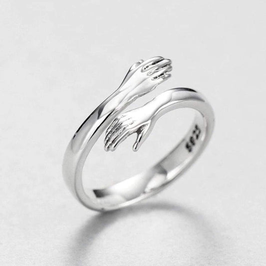 Anillo ajustable de plata para abrazar