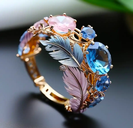 Anillo de plumas exóticas vintage con cristales