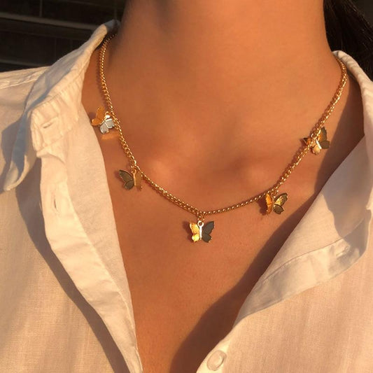 Collar de mariposa plateado y dorado